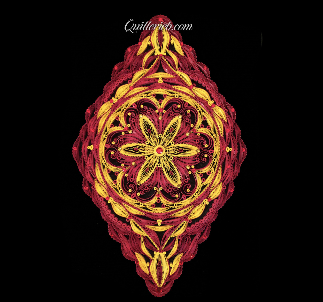 Red and Yellow inspired quilling with diamond shape design full view.