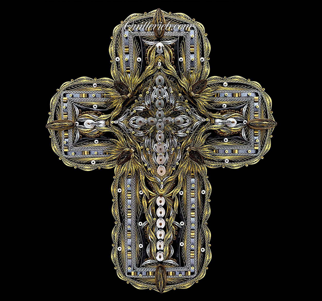 Image of quilled cross gold and silver full frame.