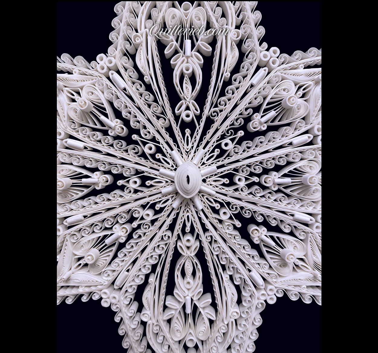 8-Point Star quilling design in brown and white tones full view.