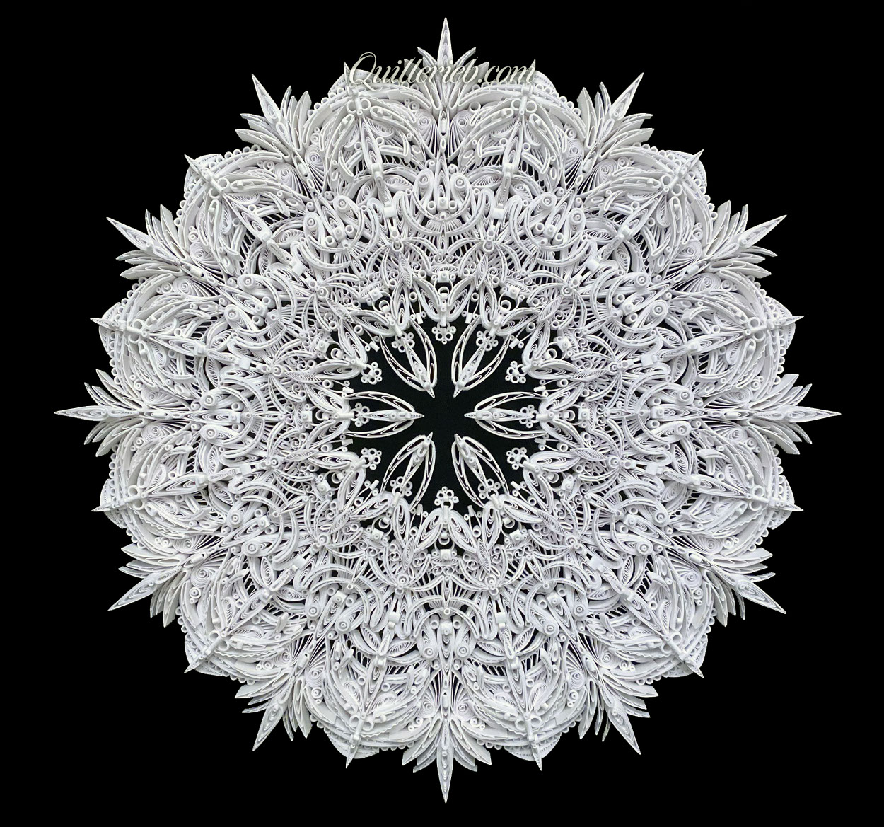 8-Point Star quilling design in brown and white tones full view.