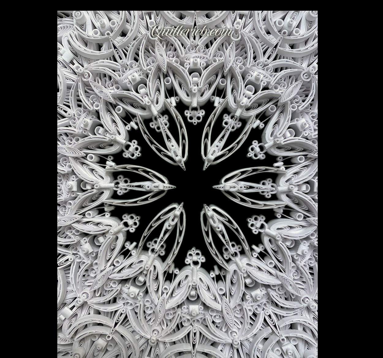 8-Point Star quilling design in brown and white tones full view.