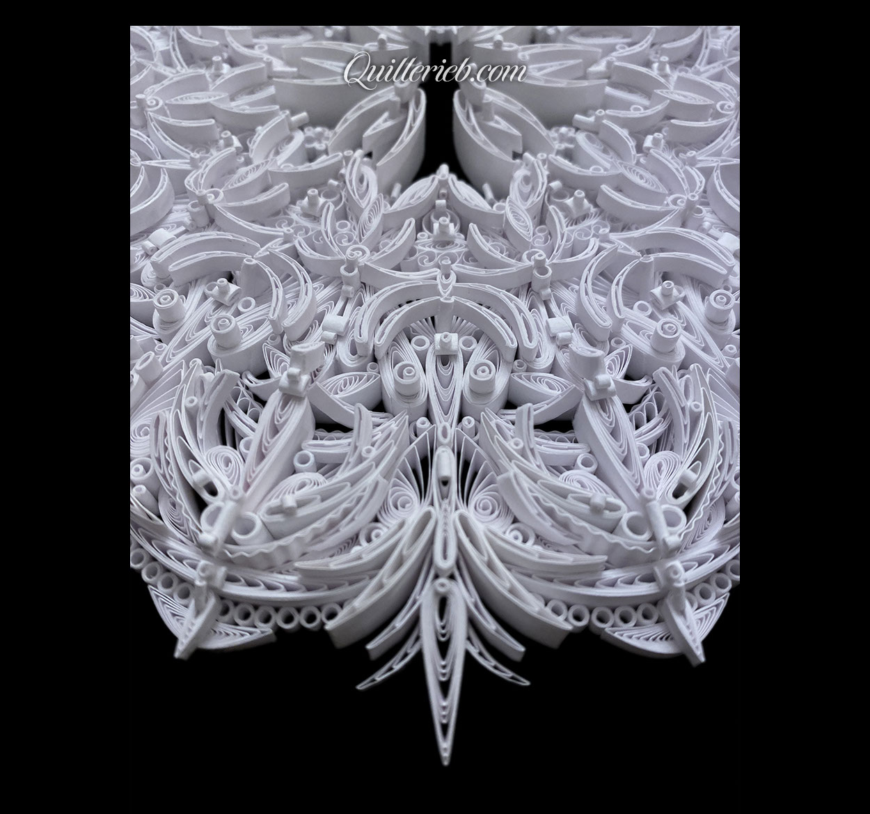 8-Point Star quilling design in brown and white tones full view.