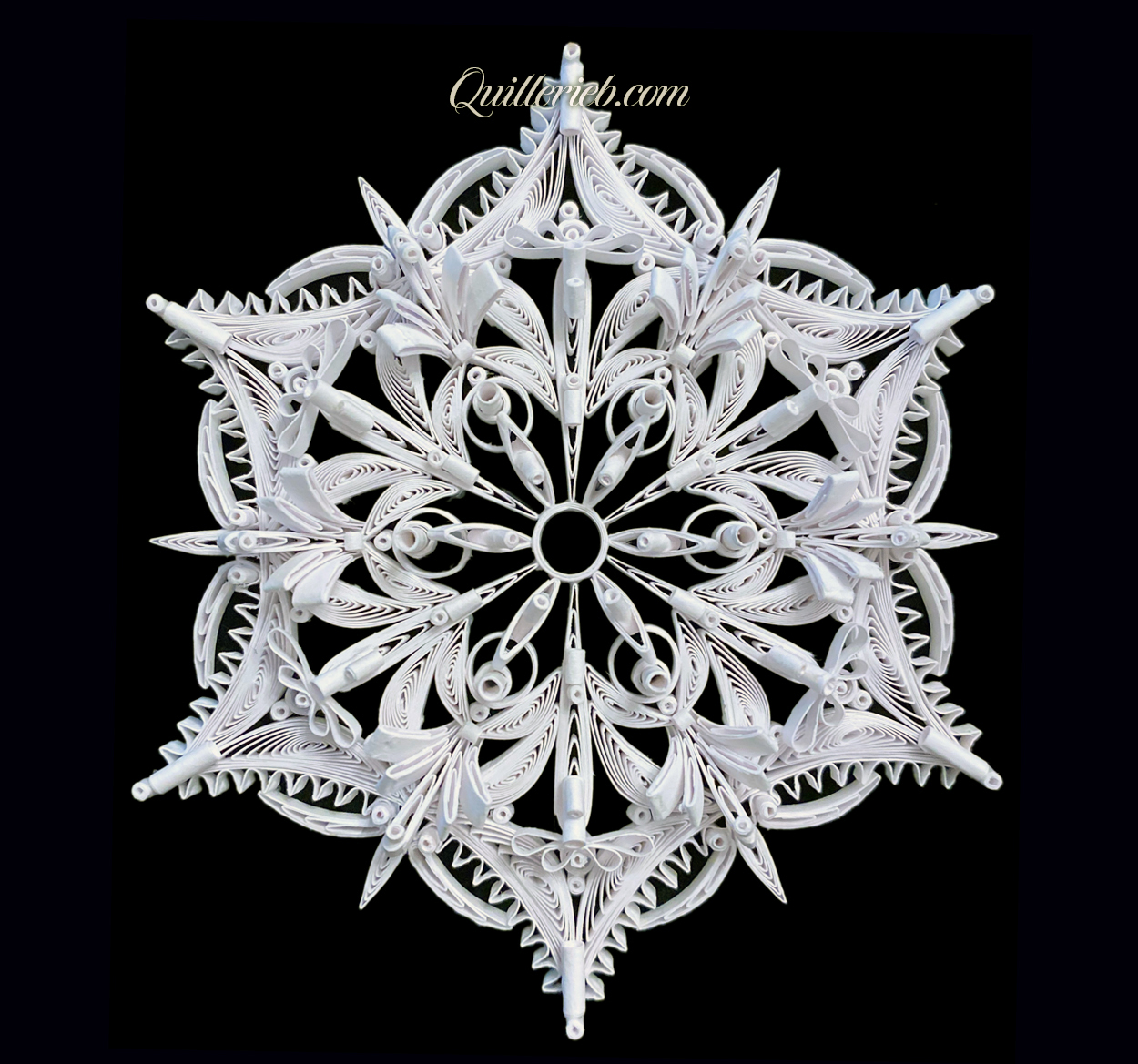 8-pointed quilling star in white, snowflake design full view.