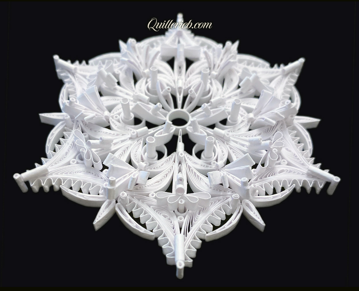 8-pointed quilling star in white, snowflake design full view.