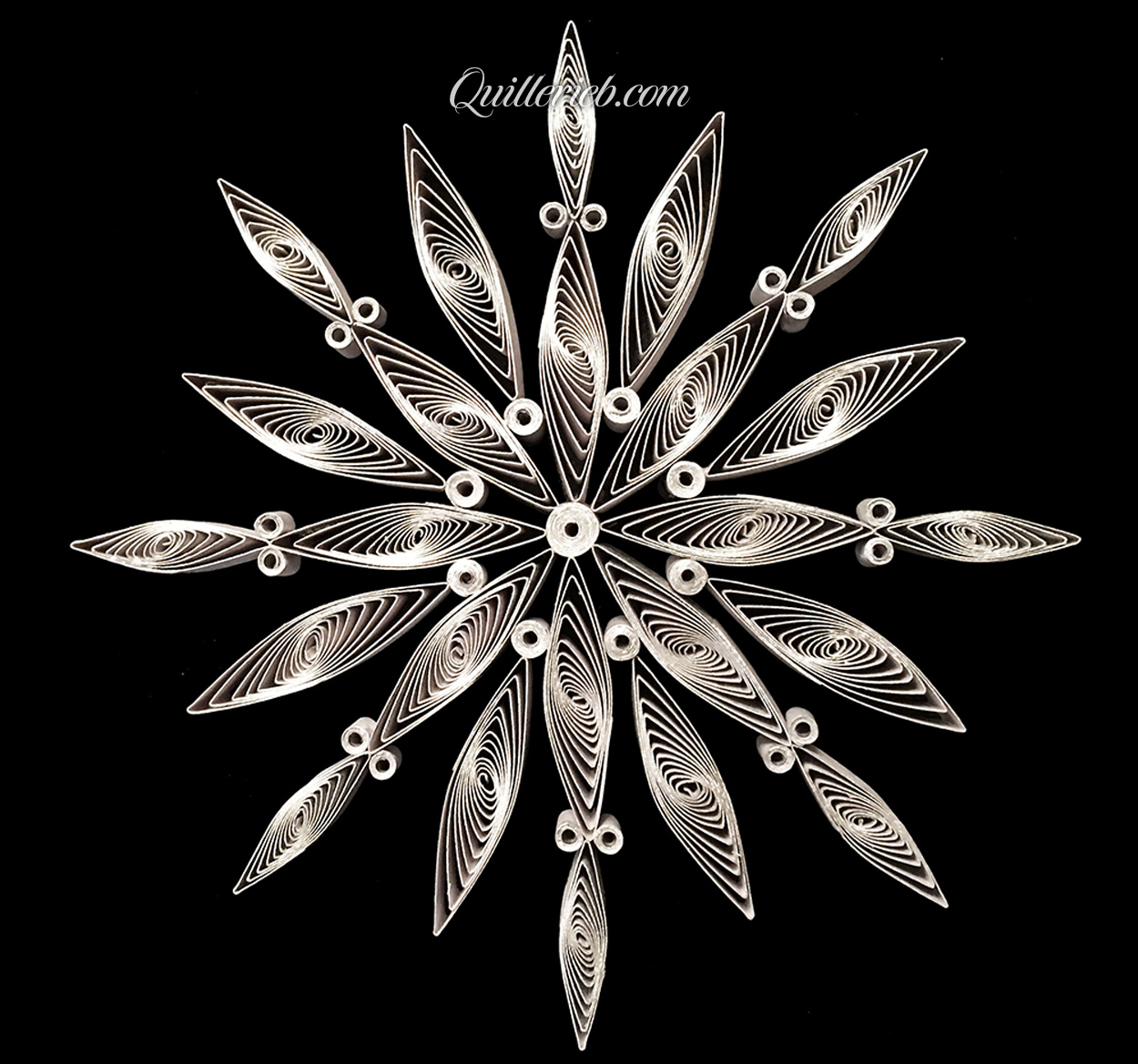 8-pointed quilling star in white, snowflake design full view.